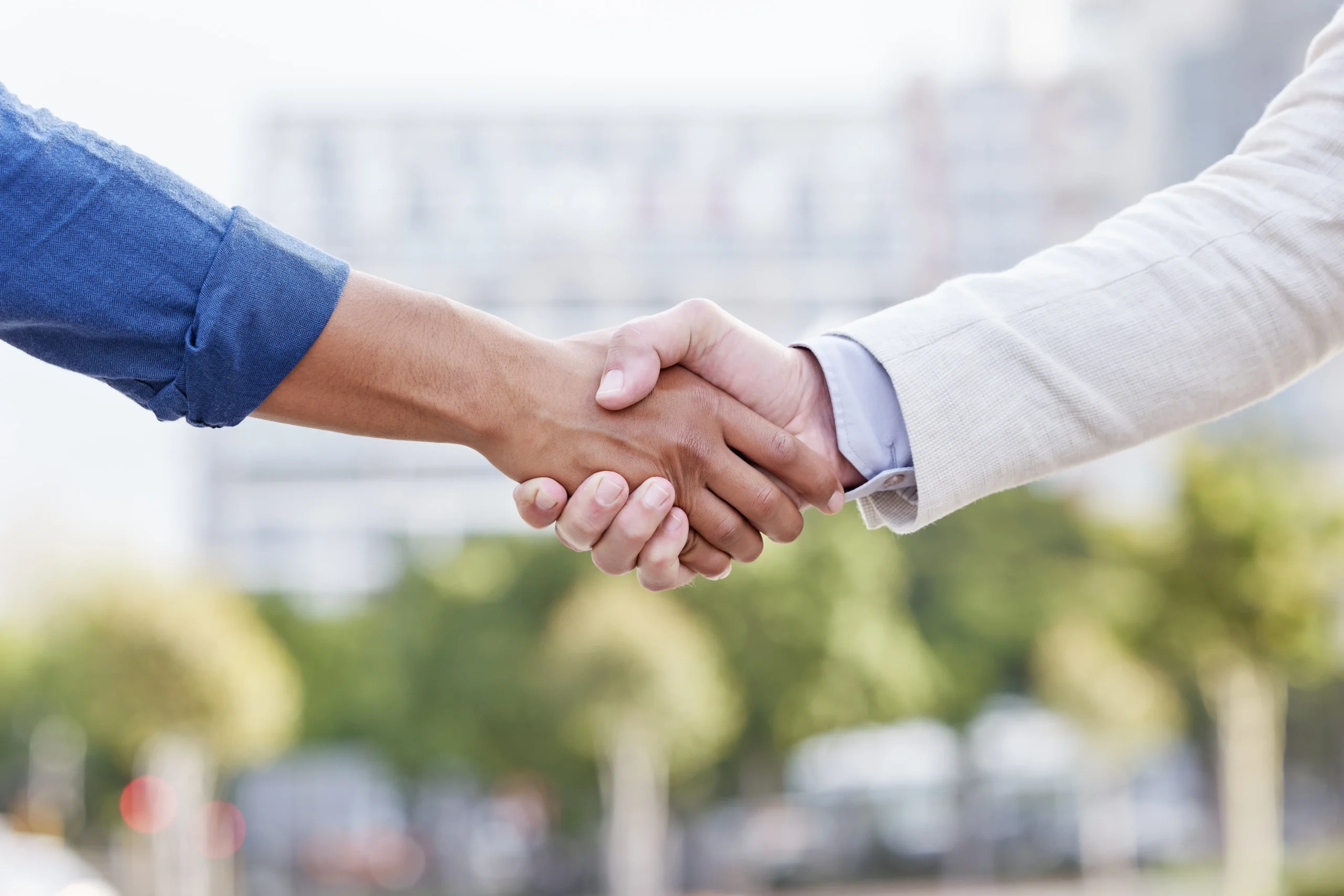 professional-handshake-in-an-urban-setting-during-2026-03-25-02-48-26-utc